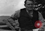 Image of Hermann Goring with pet lion cub at his hunting lodge Germany, 1935, second 46 stock footage video 65675039012