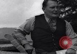 Image of Hermann Goring with pet lion cub at his hunting lodge Germany, 1935, second 47 stock footage video 65675039012