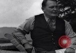 Image of Hermann Goring with pet lion cub at his hunting lodge Germany, 1935, second 49 stock footage video 65675039012