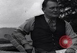 Image of Hermann Goring with pet lion cub at his hunting lodge Germany, 1935, second 51 stock footage video 65675039012