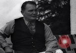 Image of Hermann Goring with pet lion cub at his hunting lodge Germany, 1935, second 62 stock footage video 65675039012