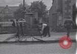 Standbild Französische Feuerwehrleute Zweiten Weltkrieg Carentan Normandie Frankreich, 1944, aus Sekunde 3 historischem Filmmaterial Videoclip 65675039037