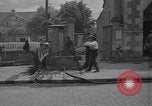 Standbild Französische Feuerwehrleute Zweiten Weltkrieg Carentan Normandie Frankreich, 1944, aus Sekunde 4 historischem Filmmaterial Videoclip 65675039037