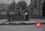 Standbild Französische Feuerwehrleute Zweiten Weltkrieg Carentan Normandie Frankreich, 1944, aus Sekunde 5 historischem Filmmaterial Videoclip 65675039037