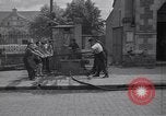 Standbild Französische Feuerwehrleute Zweiten Weltkrieg Carentan Normandie Frankreich, 1944, aus Sekunde 7 historischem Filmmaterial Videoclip 65675039037