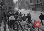 Standbild Französische Feuerwehrleute Zweiten Weltkrieg Carentan Normandie Frankreich, 1944, aus Sekunde 11 historischem Filmmaterial Videoclip 65675039037