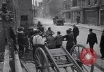 Standbild Französische Feuerwehrleute Zweiten Weltkrieg Carentan Normandie Frankreich, 1944, aus Sekunde 13 historischem Filmmaterial Videoclip 65675039037