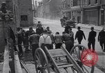 Standbild Französische Feuerwehrleute Zweiten Weltkrieg Carentan Normandie Frankreich, 1944, aus Sekunde 14 historischem Filmmaterial Videoclip 65675039037