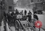 Standbild Französische Feuerwehrleute Zweiten Weltkrieg Carentan Normandie Frankreich, 1944, aus Sekunde 15 historischem Filmmaterial Videoclip 65675039037