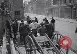 Standbild Französische Feuerwehrleute Zweiten Weltkrieg Carentan Normandie Frankreich, 1944, aus Sekunde 16 historischem Filmmaterial Videoclip 65675039037