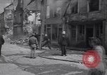 Standbild Französische Feuerwehrleute Zweiten Weltkrieg Carentan Normandie Frankreich, 1944, aus Sekunde 36 historischem Filmmaterial Videoclip 65675039037