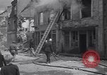 Standbild Französische Feuerwehrleute Zweiten Weltkrieg Carentan Normandie Frankreich, 1944, aus Sekunde 40 historischem Filmmaterial Videoclip 65675039037
