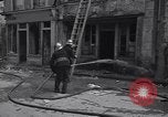 Standbild Französische Feuerwehrleute Zweiten Weltkrieg Carentan Normandie Frankreich, 1944, aus Sekunde 42 historischem Filmmaterial Videoclip 65675039037
