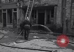 Standbild Französische Feuerwehrleute Zweiten Weltkrieg Carentan Normandie Frankreich, 1944, aus Sekunde 43 historischem Filmmaterial Videoclip 65675039037