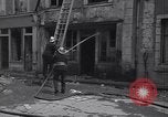 Standbild Französische Feuerwehrleute Zweiten Weltkrieg Carentan Normandie Frankreich, 1944, aus Sekunde 44 historischem Filmmaterial Videoclip 65675039037
