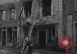 Standbild Französische Feuerwehrleute Zweiten Weltkrieg Carentan Normandie Frankreich, 1944, aus Sekunde 46 historischem Filmmaterial Videoclip 65675039037