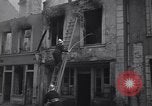 Standbild Französische Feuerwehrleute Zweiten Weltkrieg Carentan Normandie Frankreich, 1944, aus Sekunde 47 historischem Filmmaterial Videoclip 65675039037