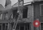Standbild Französische Feuerwehrleute Zweiten Weltkrieg Carentan Normandie Frankreich, 1944, aus Sekunde 49 historischem Filmmaterial Videoclip 65675039037