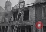Standbild Französische Feuerwehrleute Zweiten Weltkrieg Carentan Normandie Frankreich, 1944, aus Sekunde 52 historischem Filmmaterial Videoclip 65675039037