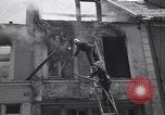 Standbild Französische Feuerwehrleute Zweiten Weltkrieg Carentan Normandie Frankreich, 1944, aus Sekunde 60 historischem Filmmaterial Videoclip 65675039037