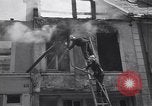 Standbild Französische Feuerwehrleute Zweiten Weltkrieg Carentan Normandie Frankreich, 1944, aus Sekunde 62 historischem Filmmaterial Videoclip 65675039037