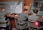 Image of Airmen at monitoring stations inside munitions storage facility U-Tapao Royal Thai Air Force Base Thailand, 1969, second 42 stock footage video 65675039061