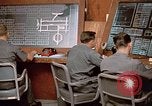 Image of Airmen at monitoring stations inside munitions storage facility U-Tapao Royal Thai Air Force Base Thailand, 1969, second 47 stock footage video 65675039061