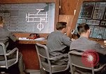 Image of Airmen at monitoring stations inside munitions storage facility U-Tapao Royal Thai Air Force Base Thailand, 1969, second 48 stock footage video 65675039061