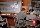 Image of Airmen at monitoring stations inside munitions storage facility U-Tapao Royal Thai Air Force Base Thailand, 1969, second 49 stock footage video 65675039061