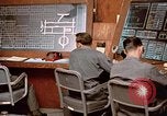 Image of Airmen at monitoring stations inside munitions storage facility U-Tapao Royal Thai Air Force Base Thailand, 1969, second 52 stock footage video 65675039061