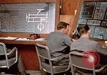 Image of Airmen at monitoring stations inside munitions storage facility U-Tapao Royal Thai Air Force Base Thailand, 1969, second 55 stock footage video 65675039061