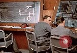 Image of Airmen at monitoring stations inside munitions storage facility U-Tapao Royal Thai Air Force Base Thailand, 1969, second 56 stock footage video 65675039061