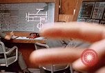 Image of Airmen at monitoring stations inside munitions storage facility U-Tapao Royal Thai Air Force Base Thailand, 1969, second 59 stock footage video 65675039061
