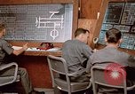 Image of Airmen at monitoring stations inside munitions storage facility U-Tapao Royal Thai Air Force Base Thailand, 1969, second 60 stock footage video 65675039061