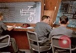 Image of Airmen at monitoring stations inside munitions storage facility U-Tapao Royal Thai Air Force Base Thailand, 1969, second 61 stock footage video 65675039061