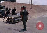 Standbild Air Force Munition Team mit mobilen Kran offload Bomben vom Lkw U-Tapao Royal Thai Air Force Base Thailand, 1969, aus Sekunde 27 historischem Filmmaterial Videoclip 65675039067