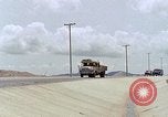 Standbild Air Force Munition Team mit mobilen Kran offload Bomben vom Lkw U-Tapao Royal Thai Air Force Base Thailand, 1969, aus Sekunde 49 historischem Filmmaterial Videoclip 65675039067