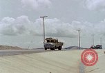 Standbild Air Force Munition Team mit mobilen Kran offload Bomben vom Lkw U-Tapao Royal Thai Air Force Base Thailand, 1969, aus Sekunde 51 historischem Filmmaterial Videoclip 65675039067