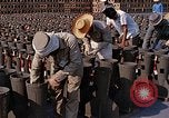 Standbild Thailändische Arbeiter sauber hinteren Abschnitte der M 117 Allgemeine Bomben U-Tapao Royal Thai Air Force Base Thailand, 1969, aus Sekunde 54 historischem Filmmaterial Videoclip 65675039070