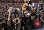 Standbild Thailändische Arbeiter sauber hinteren Abschnitte der M 117 Allgemeine Bomben U-Tapao Royal Thai Air Force Base Thailand, 1969, aus Sekunde 59 historischem Filmmaterial Videoclip 65675039070