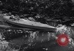Image of Motorised Submersible Canoe Sleeping Beauty United Kingdom, 1943, second 44 stock footage video 65675039090