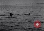 Image of Motorised Submersible Canoe Sleeping Beauty United Kingdom, 1943, second 62 stock footage video 65675039090