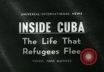 Image of Refugees Cuba, 1963, second 15 stock footage video 65675039111