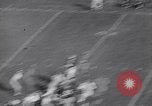Standbild Fußball Ann Arbor Michigan USA, 1963, aus Sekunde 46 historischem Filmmaterial Videoclip 65675039174