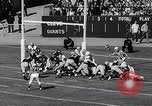 Standbild Football Game New York United States USA, 1963, aus Sekunde 46 historischem Filmmaterial Videoclip 65675039175