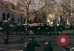 Image of flag-draped casket Washington DC USA, 1963, second 26 stock footage video 65675039219