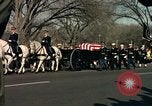 Image of flag-draped casket Washington DC USA, 1963, second 52 stock footage video 65675039219