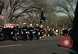 Image of flag-draped casket Washington DC USA, 1963, second 57 stock footage video 65675039219