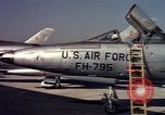 Image of United States Air Force F-100 jet planes Andrews Air Force Base Maryland USA, 1963, second 58 stock footage video 65675039271