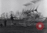 Image of failed ornithopter helicopter trying to fly Chicago Illinois USA, 1925, second 38 stock footage video 65675039280